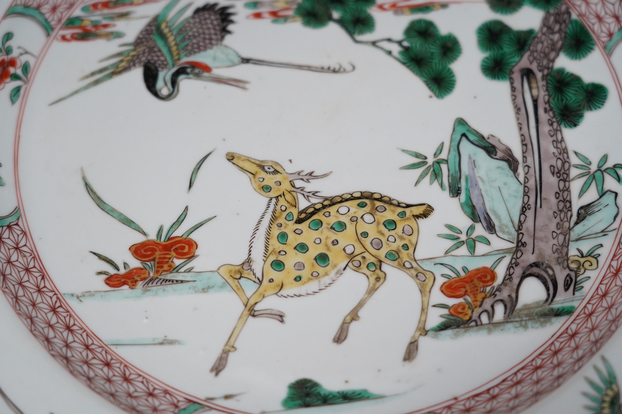 A Chinese famille verte ‘deer and crane’ dish, Kangxi period
